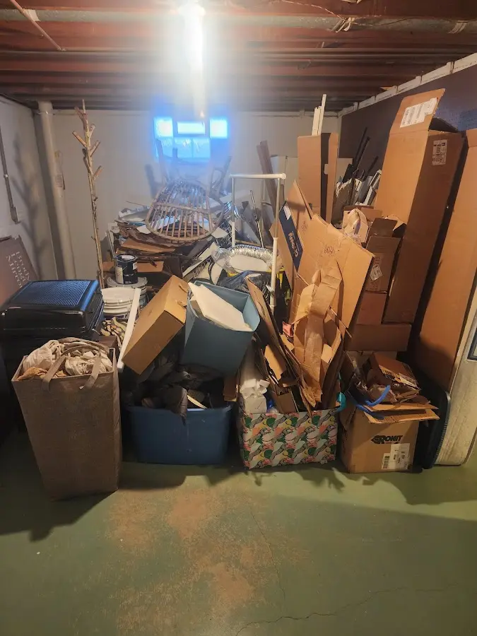 Roll-off dumpster container at job site for 2 Yard Dumpster Rental in Porter